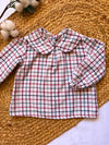 Blusa cuello bebé de cuadros multicolor con fondo blanco Almendro