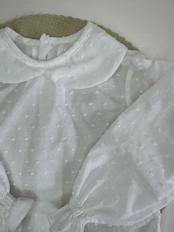 Blusa de algodón blanco de cuello bebé Cala