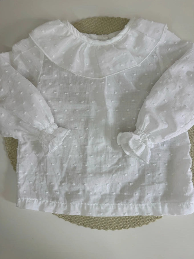 Blusa de algodón blanco de cuello volante Cala