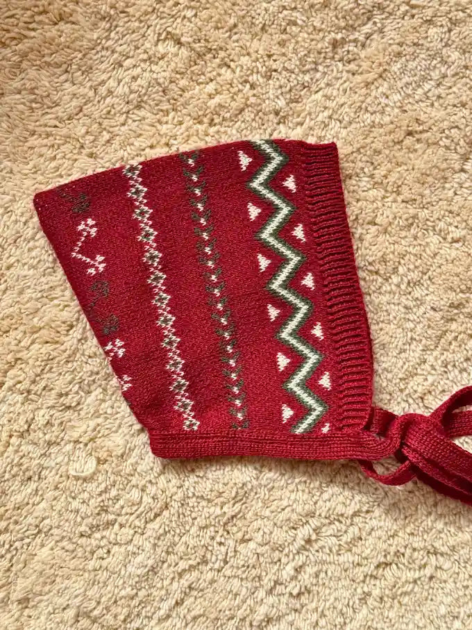 Capota de punto jacquard burdeos - Colección Acebo