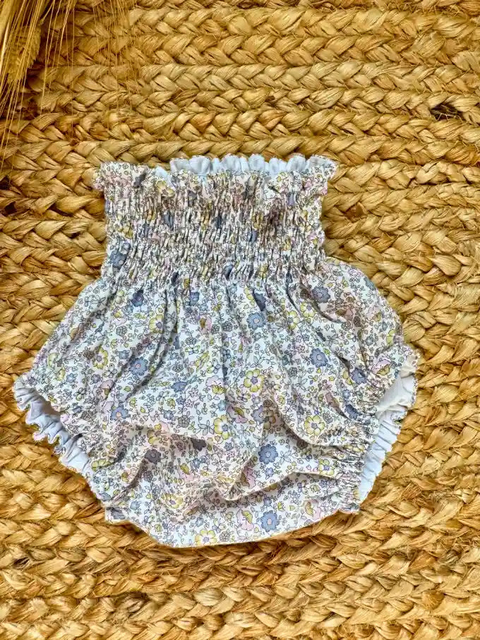 Cubrepañal con estampado de flores azul y rosa Verbena