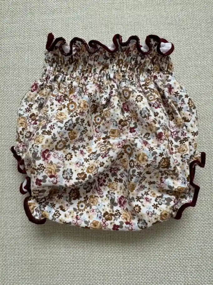 Cubrepañal con encantador estampado floral - Camelia