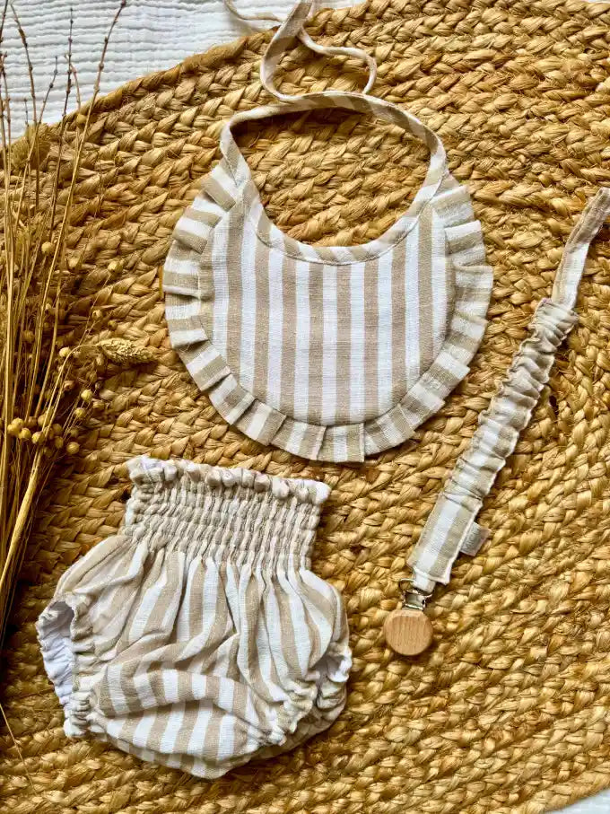 Pack cubrepañal, babero y chupetero de rayas beige Espiga